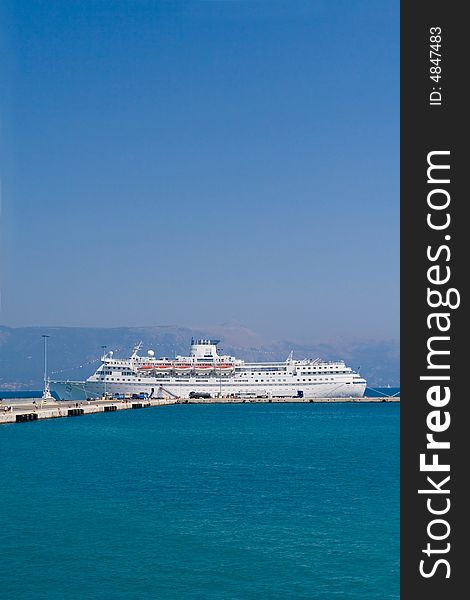 Big white tourist ship liner in Corfu island. Big white tourist ship liner in Corfu island