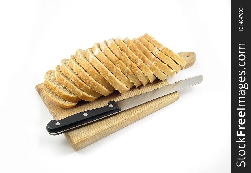 Bread and knife cut isolated on white background