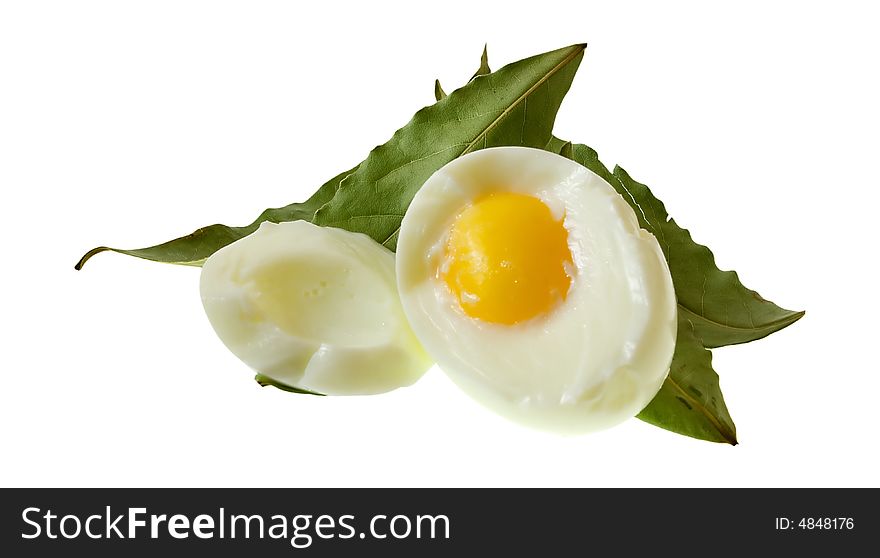 Isolated egg and the bay leafes. Isolated egg and the bay leafes