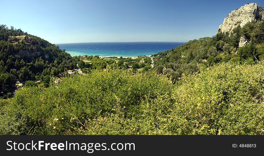 Beach on the Samos island, Greece. Panoramic view from a hill on the island.