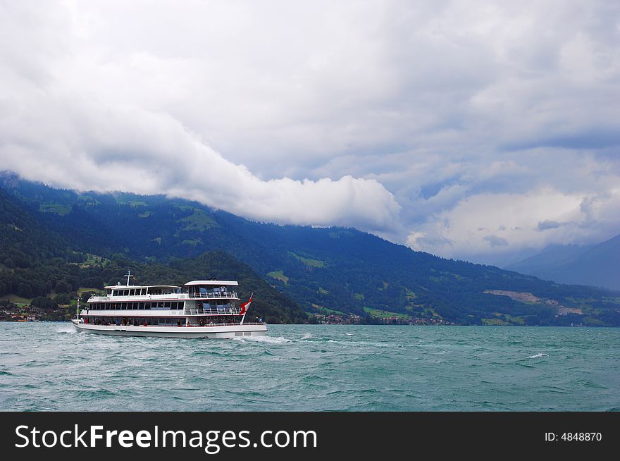 Rainstorm coming，the ship is sailing in Thun lake, switzerland. Rainstorm coming，the ship is sailing in Thun lake, switzerland.