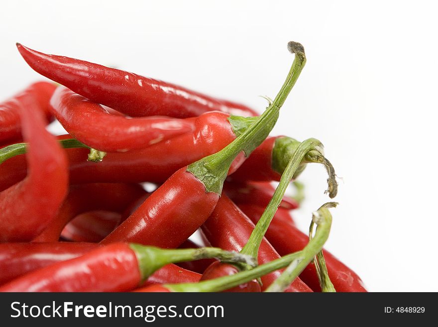 A pile of red chili peppers. A pile of red chili peppers