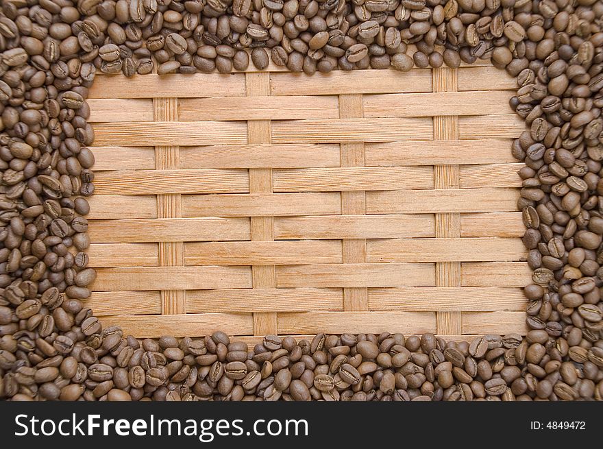 Coffee in grains on a background of a tree. Coffee in grains on a background of a tree.