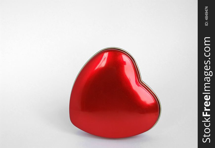 Red heart against white background