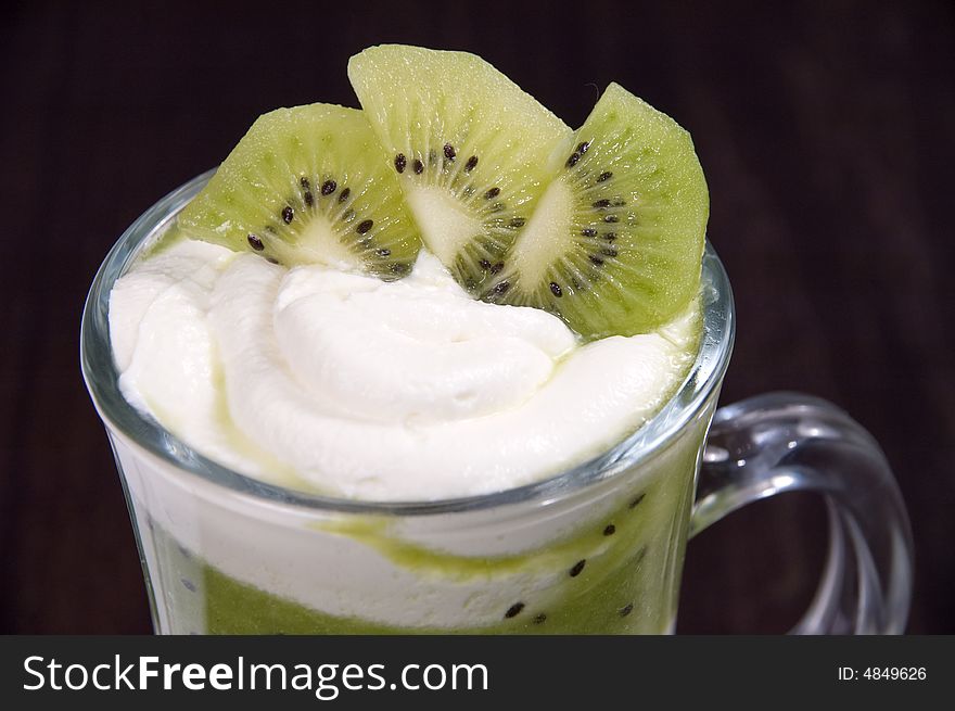 Whipped cream with fruit. Kiwi. Whipped cream with fruit. Kiwi.