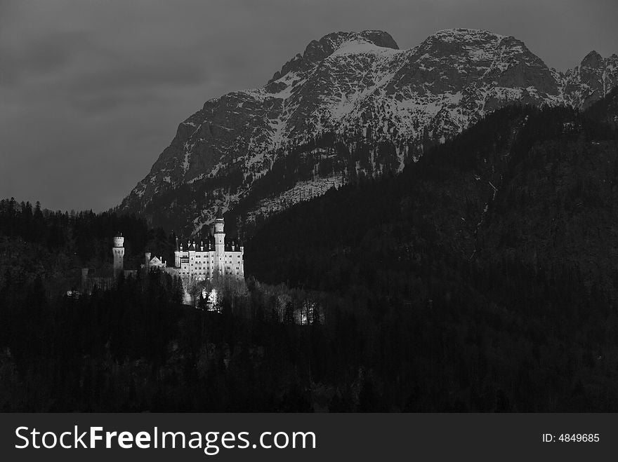Famous castle Neuschwanstein. Bavaria, Germany. Monochrome photograph.