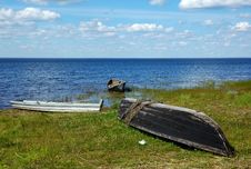 Three Old Wooden Boats On The Lake Bank Royalty Free Stock Image Three Old Wooden Boats On The Lake Bank Royalty Free Stock Image