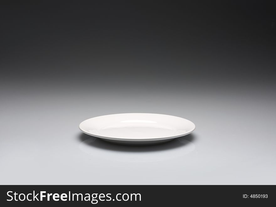 Plate on a black to gray background