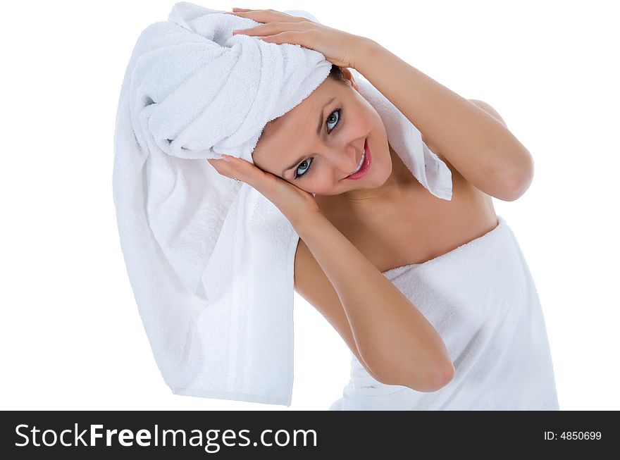 Beautiful girl with towel on white