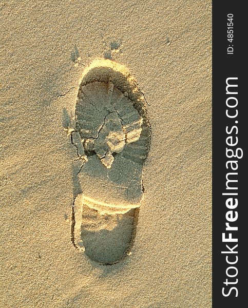 Shoe footprint in the sand of beach. Shoe footprint in the sand of beach