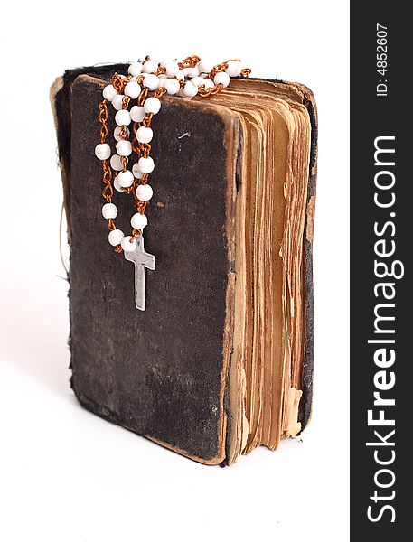 Old holy bible with cross