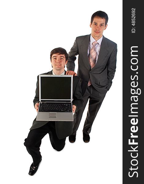 Two young businessmen with notebook one stands on knee