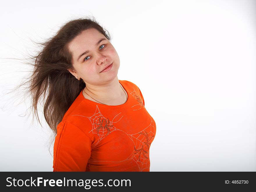 Long-haired brunet girl moving in wind