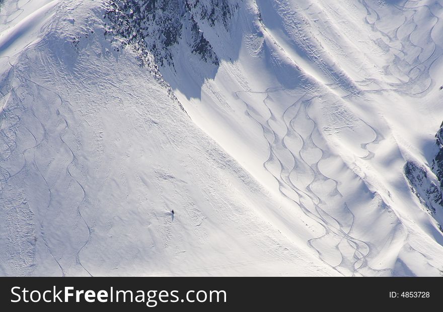 Fresh ski tracks in the alps during winter