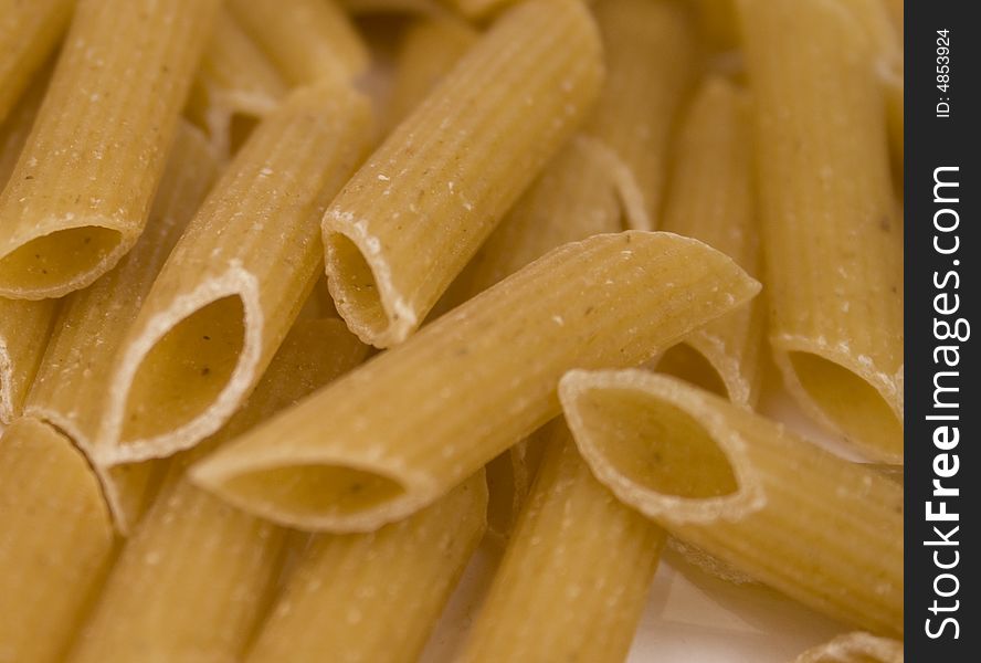 Close up of brown pasta tube