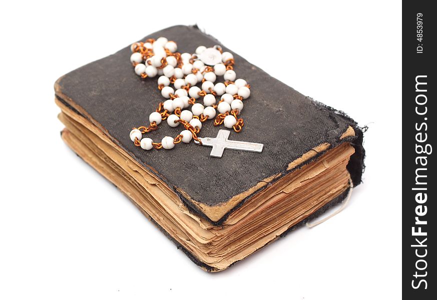 Old holy bible with cross