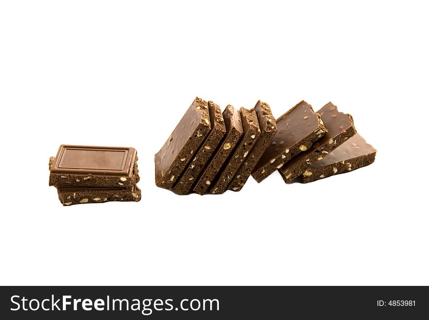 Blocks of milky chocolate isolated on white