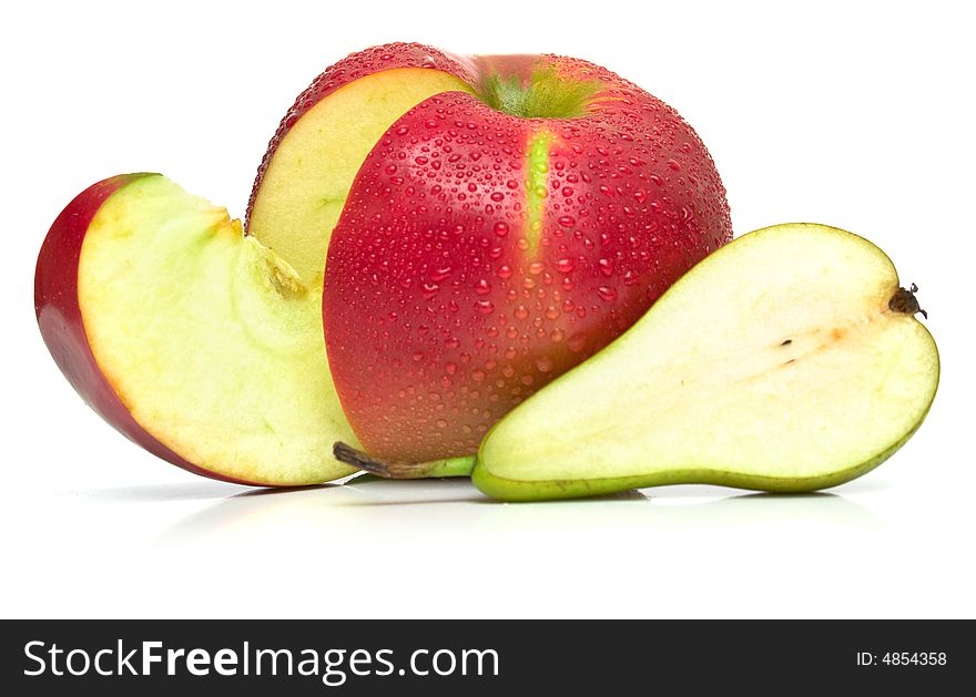 Juicy green pear and ripe red apple. Isolated, shallow DOF.