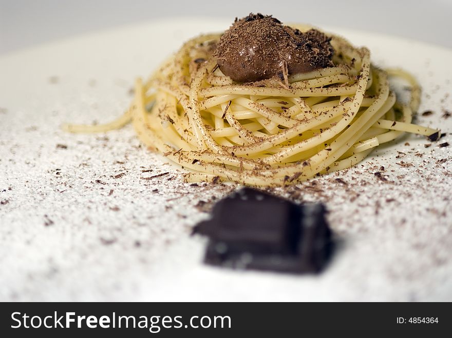 Dessert with chocolate and sweet spaghetti. Dessert with chocolate and sweet spaghetti