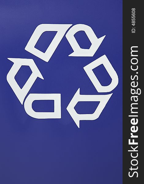 White recycle arrows on blue
