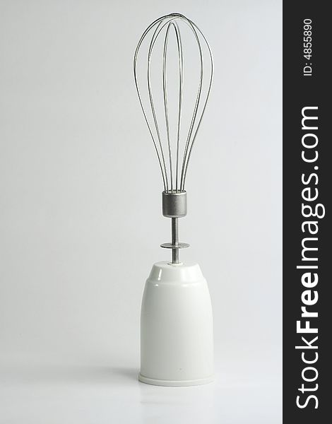 One hand mixer over a white background. One hand mixer over a white background