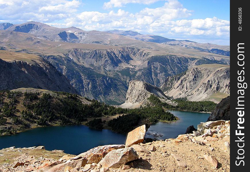 A look at the Yellow stone lake below from a mountain peek