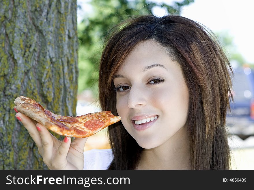 Girl Eating Pizza