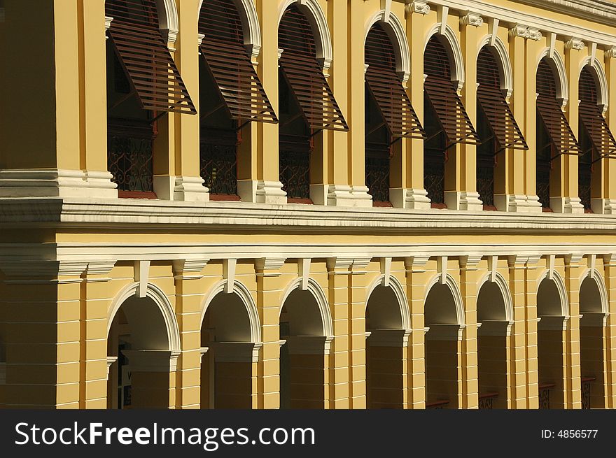 Yellow brick building with parallel arch windows. Yellow brick building with parallel arch windows