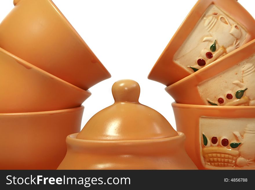 Gift tea service of brown color on a white background