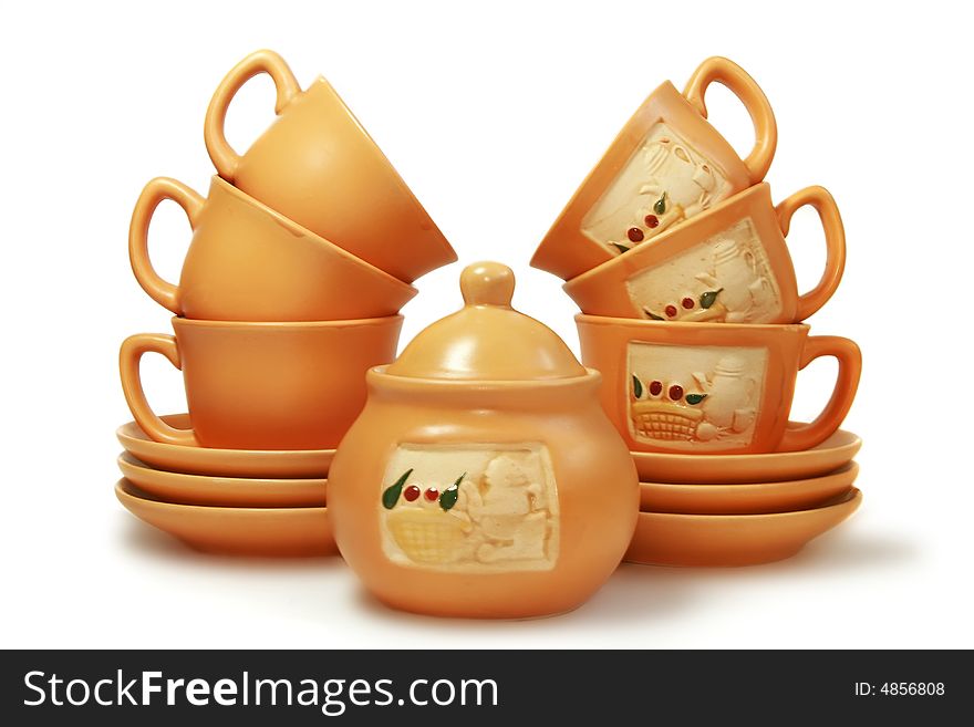 Gift tea service of brown color on a white background