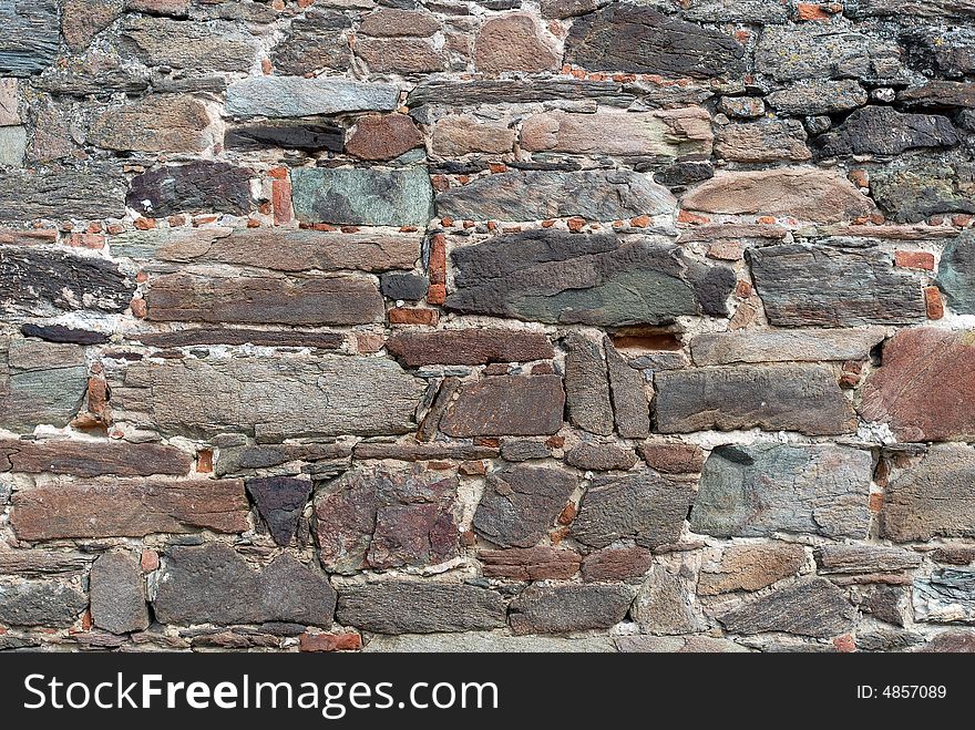 Close-up of old wall, stone blocks used as a construction material