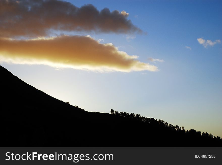 Silhouette Of Mountain At Sunset