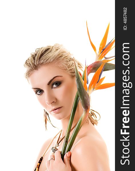 blond woman with strelizia flowers isolated on white background