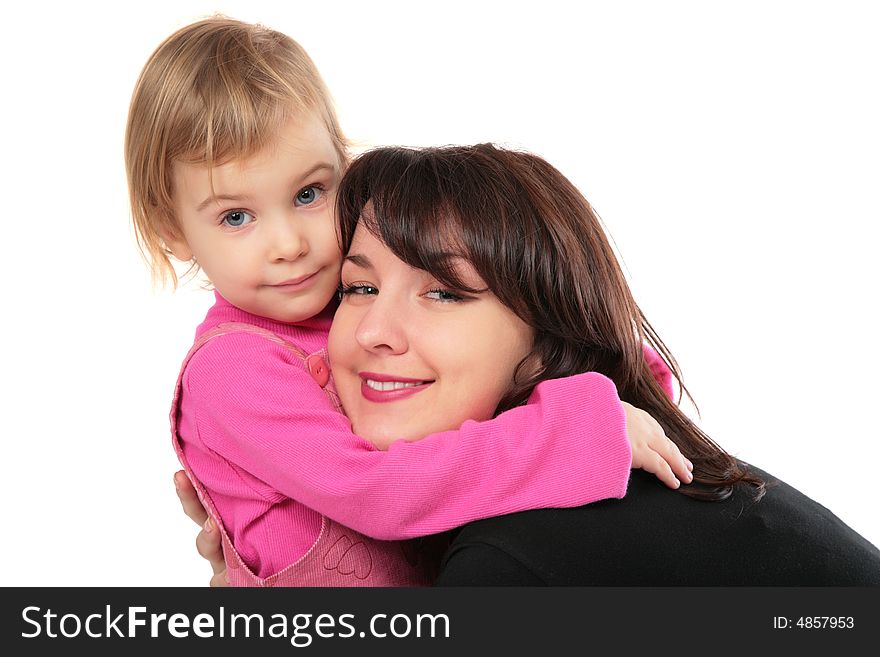 Daughter embraces mother on a white