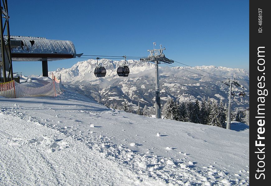 Gondola lift station in mountain of Austrian alps