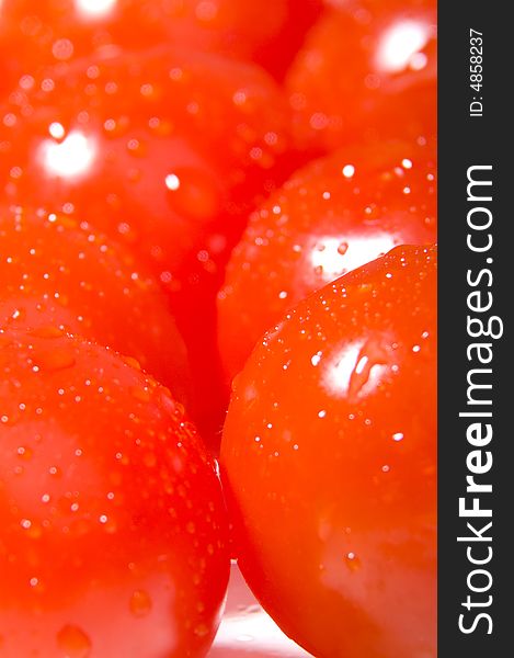 Fresh cherry tomatoes background macro