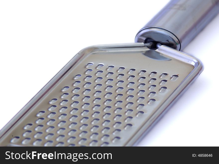 Parmesan grater close up  isolated on white