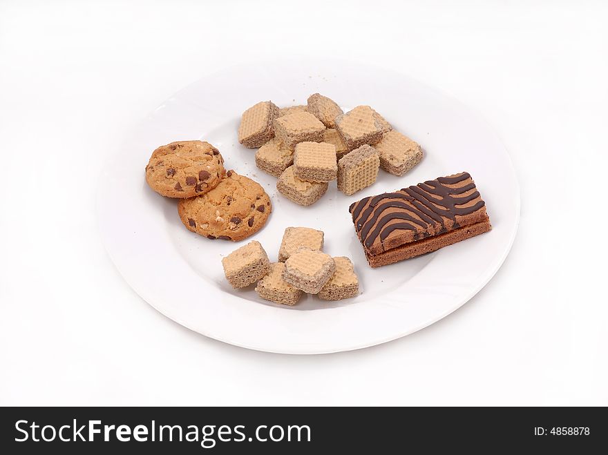 Cookies on a plate on white background