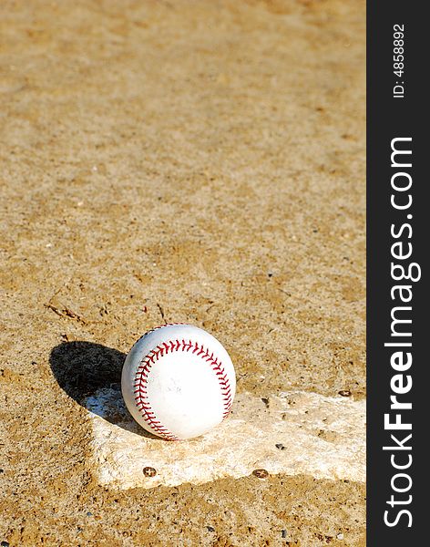 Baseball on a pitching mound. Baseball on a pitching mound