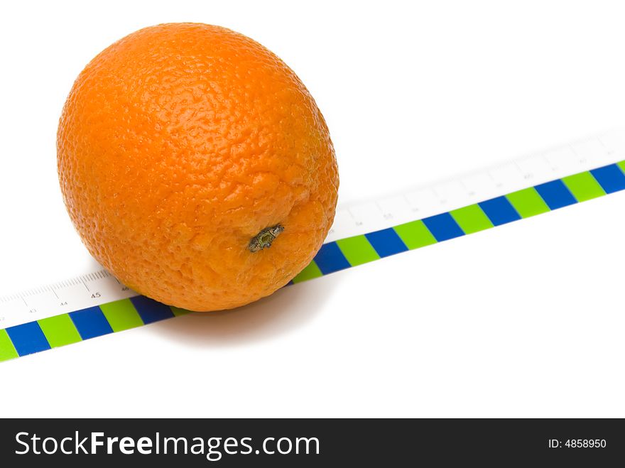 Orange and tape measure isolated