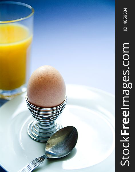 Boiled egg with orange juice. Boiled egg with orange juice