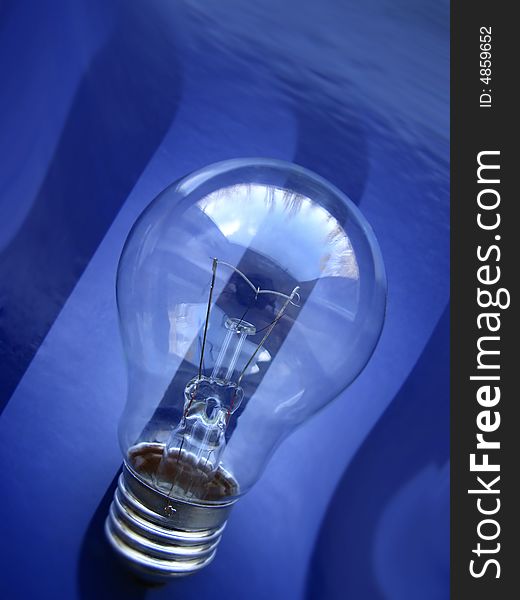 Electric lamp on  dark blue background,  close up