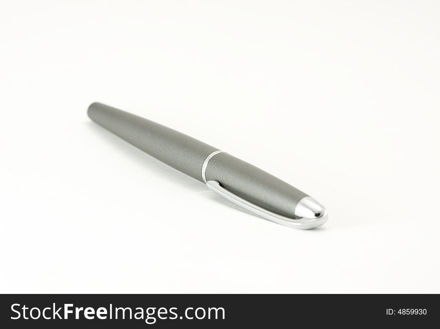 Single ballpoint pen isolated on white