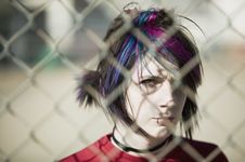 Punk Girl Behind Chain Link Royalty Free Stock Images Punk Girl Behind Chain Link Royalty Free Stock Images