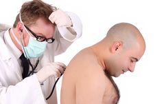 Doctor Checking A Patient Stock Photo Doctor Checking A Patient Stock Photo