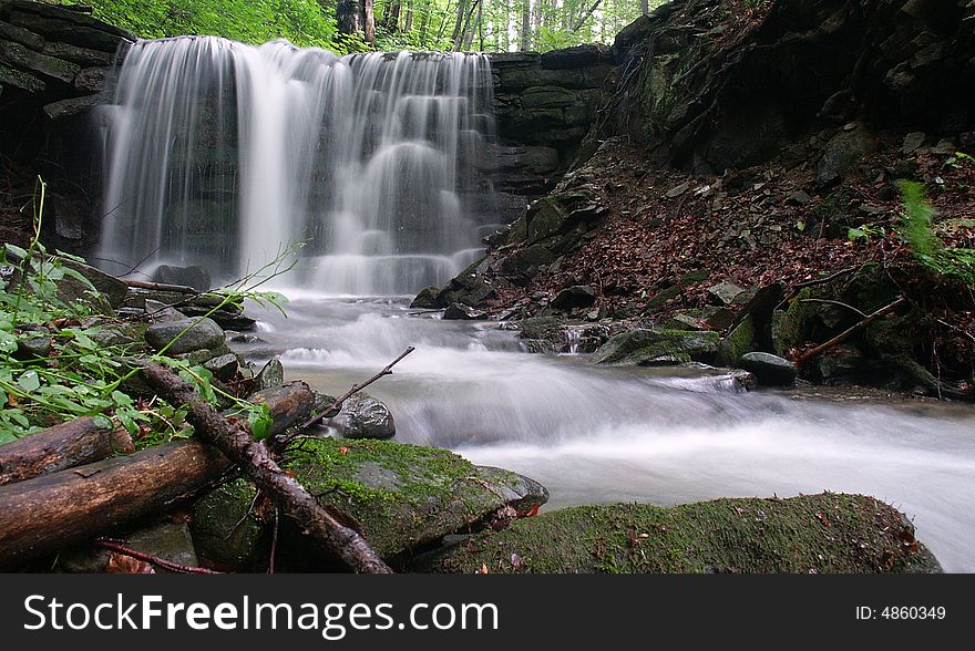 Photo of waterfall in the forest. Photo of waterfall in the forest