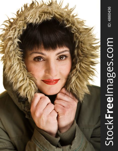 Close up of a woman with red lips wearing a nice warm winter jacket. Close up of a woman with red lips wearing a nice warm winter jacket.