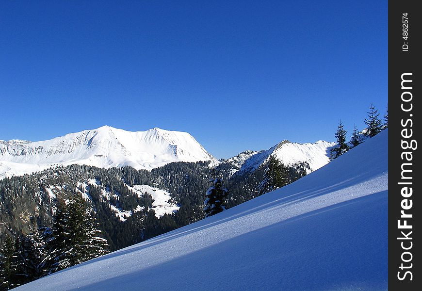 Beautiful calm  morning in the winter mountains. Beautiful calm  morning in the winter mountains