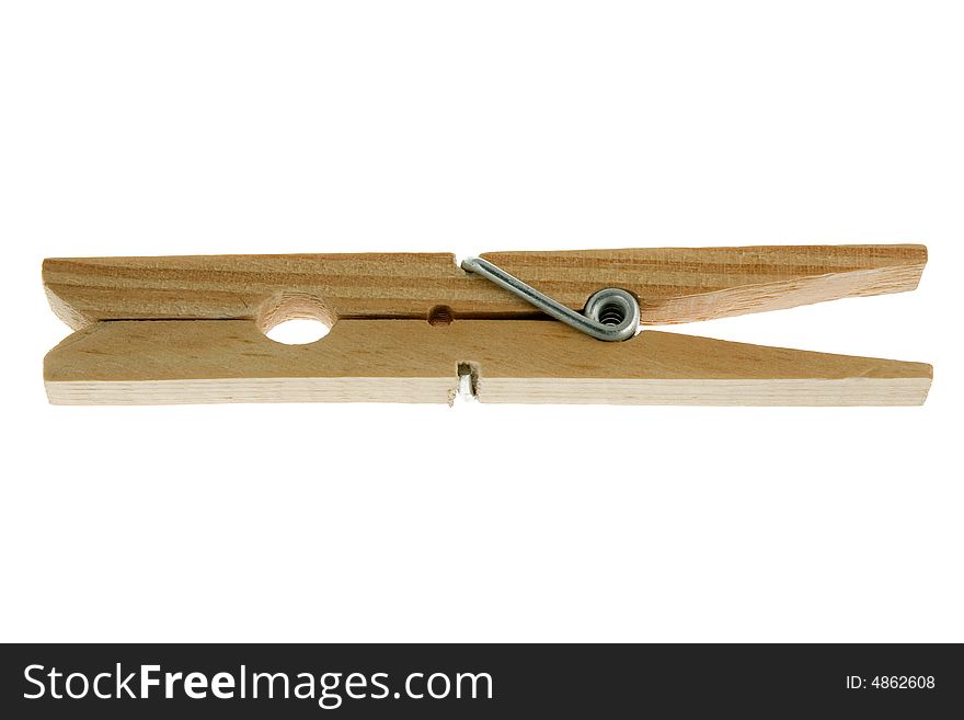 One isolated wooden clothespin (photo). One isolated wooden clothespin (photo)