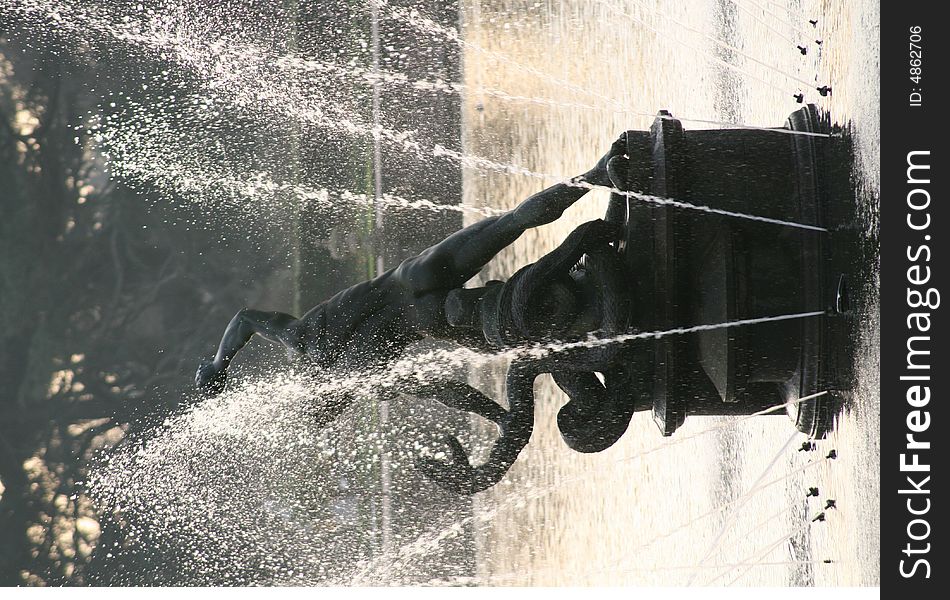 Fountain Statue In A Pond